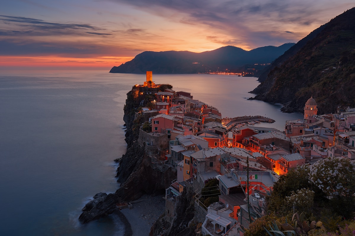 Colorful houses cascading down the hillside in a Cinque Terre village