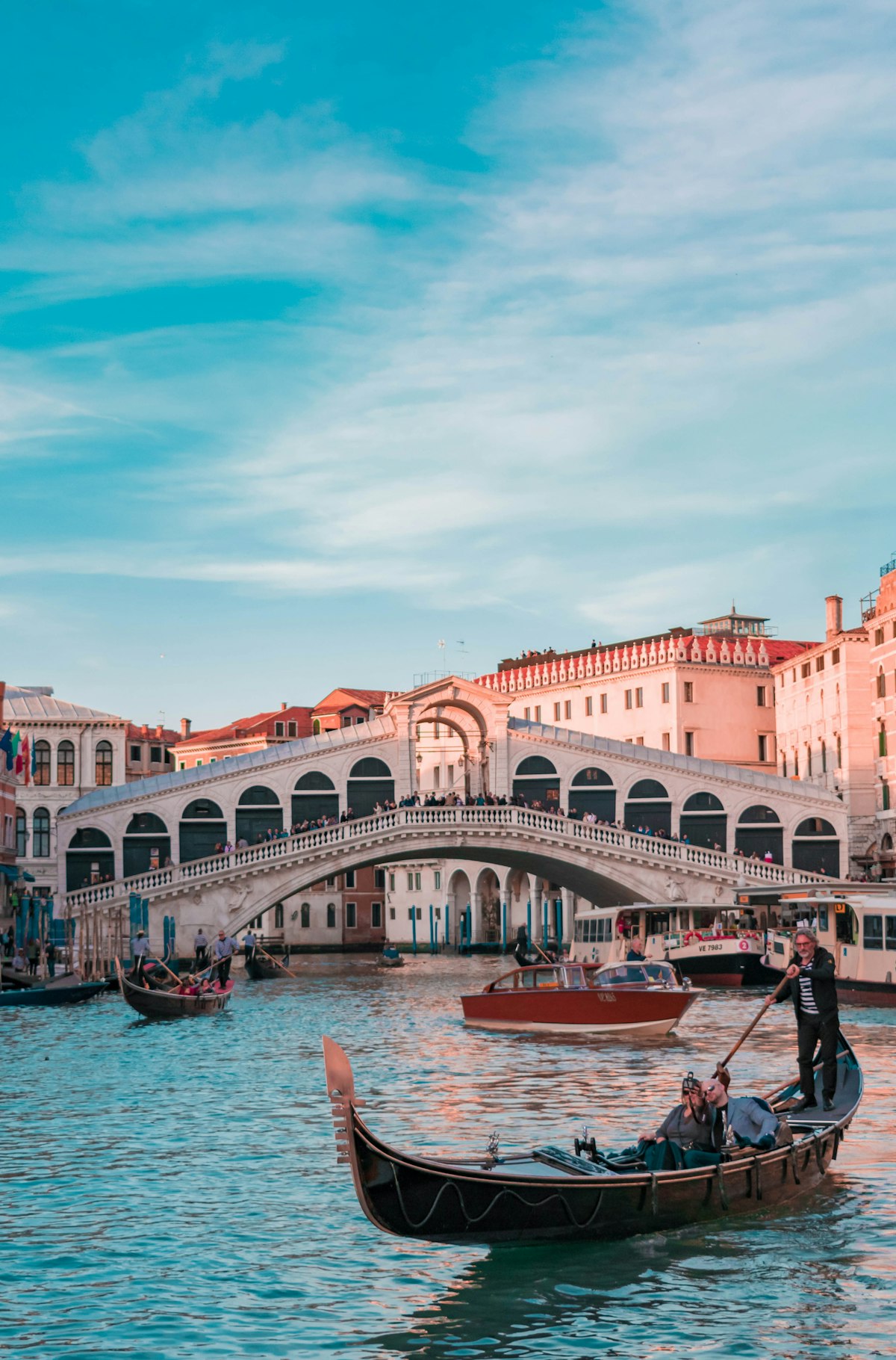 Private water taxi on Venice Grand Canal in spring golden light