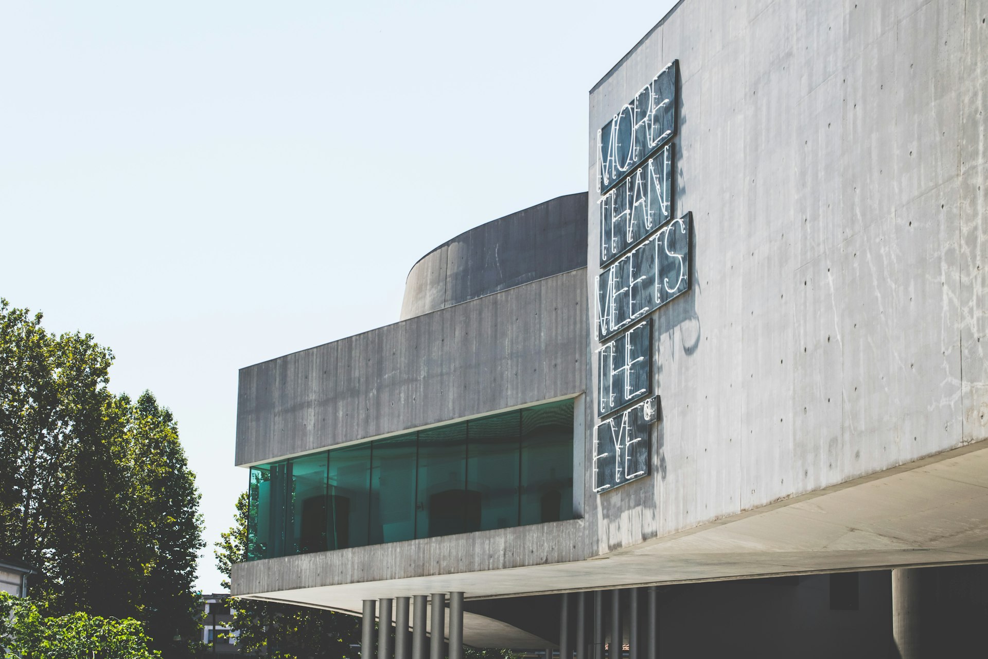 Contemporary Roman architecture with curved concrete forms reminiscent of the MAXXI museum